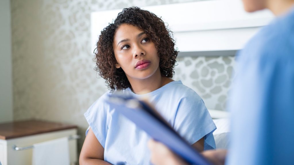 hero-patient-1024x576 A clinician and patient discussing a third trimester late term abortion.